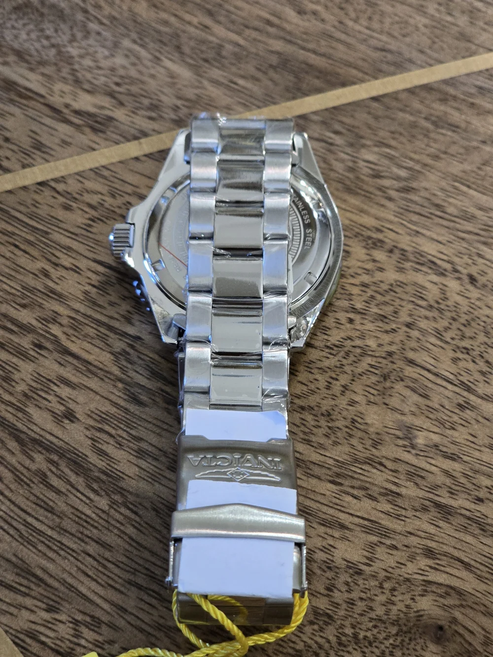 Invicta Silver Stainless Steel Watch with Black Dial and Bezel